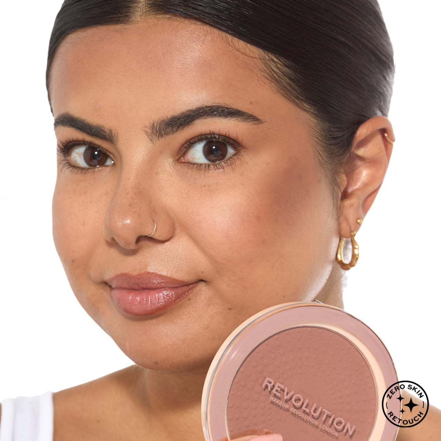 Makeup Revolution vegan and cruelty free face bronzer swatched on skin