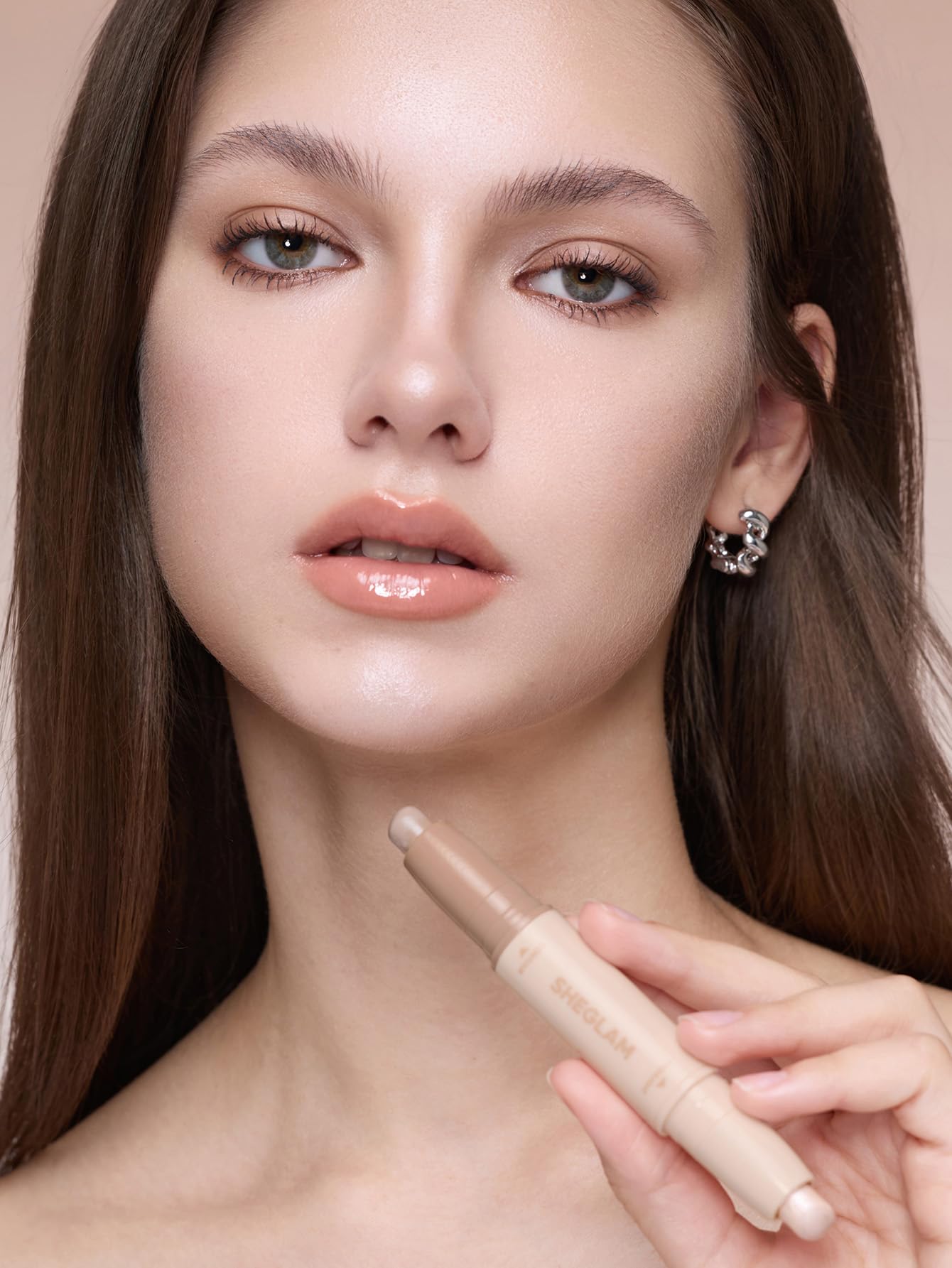 SHEGLAM dual ended face sculpting stick showing the product textures and caps