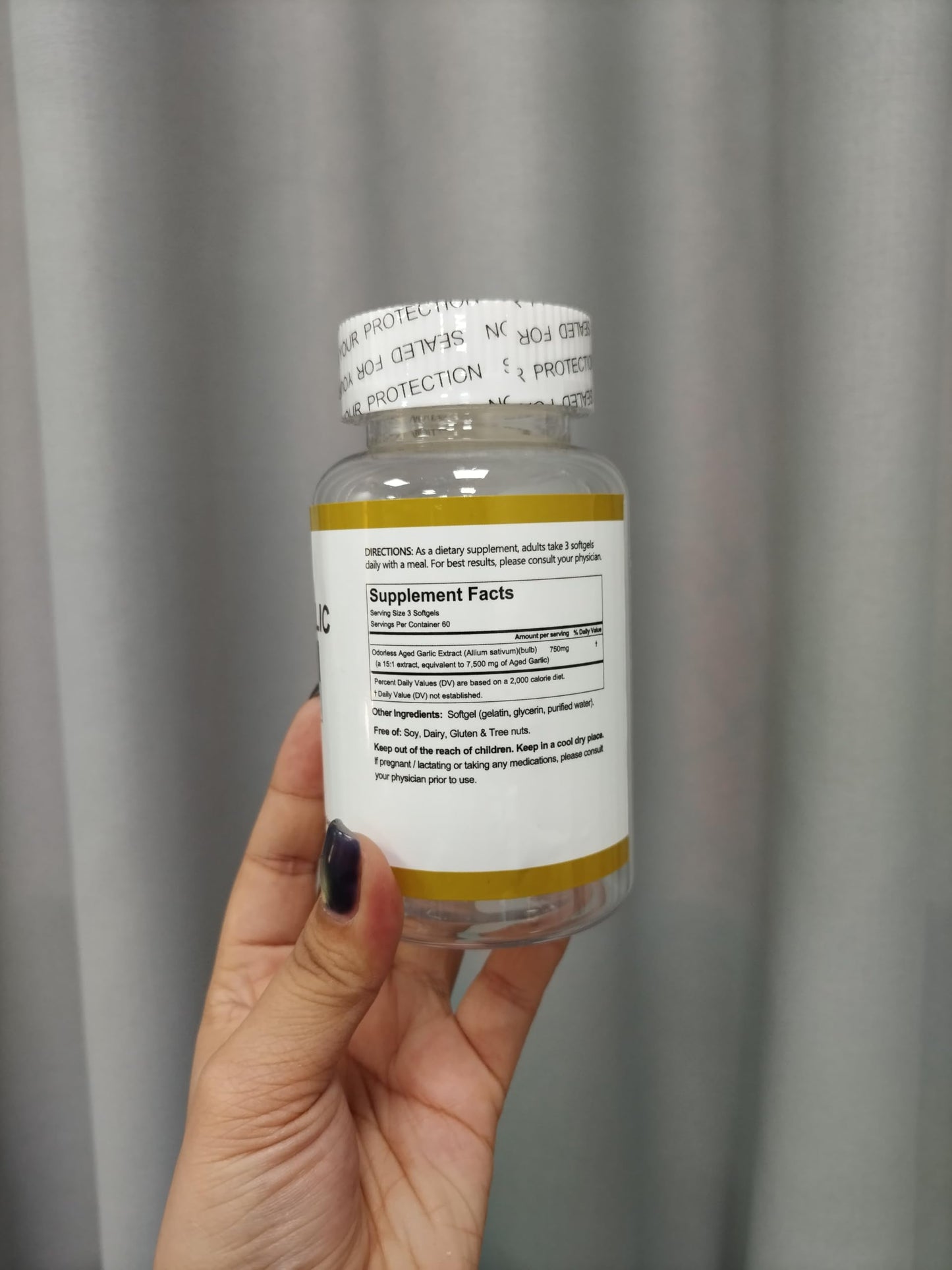 Secure packaging of authentic RTQSU premium aged garlic extract softgels.