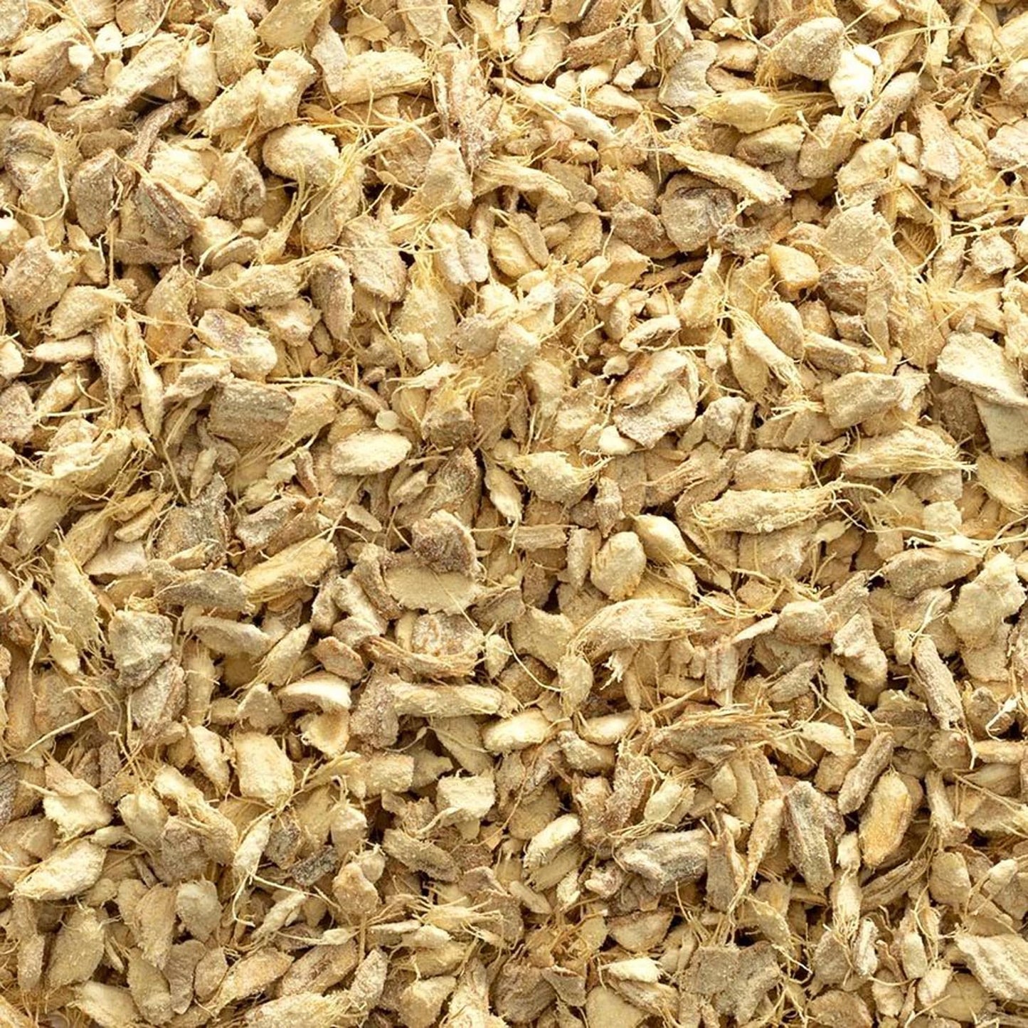 Brewing homemade ginger root herbal tea with dried loose pieces