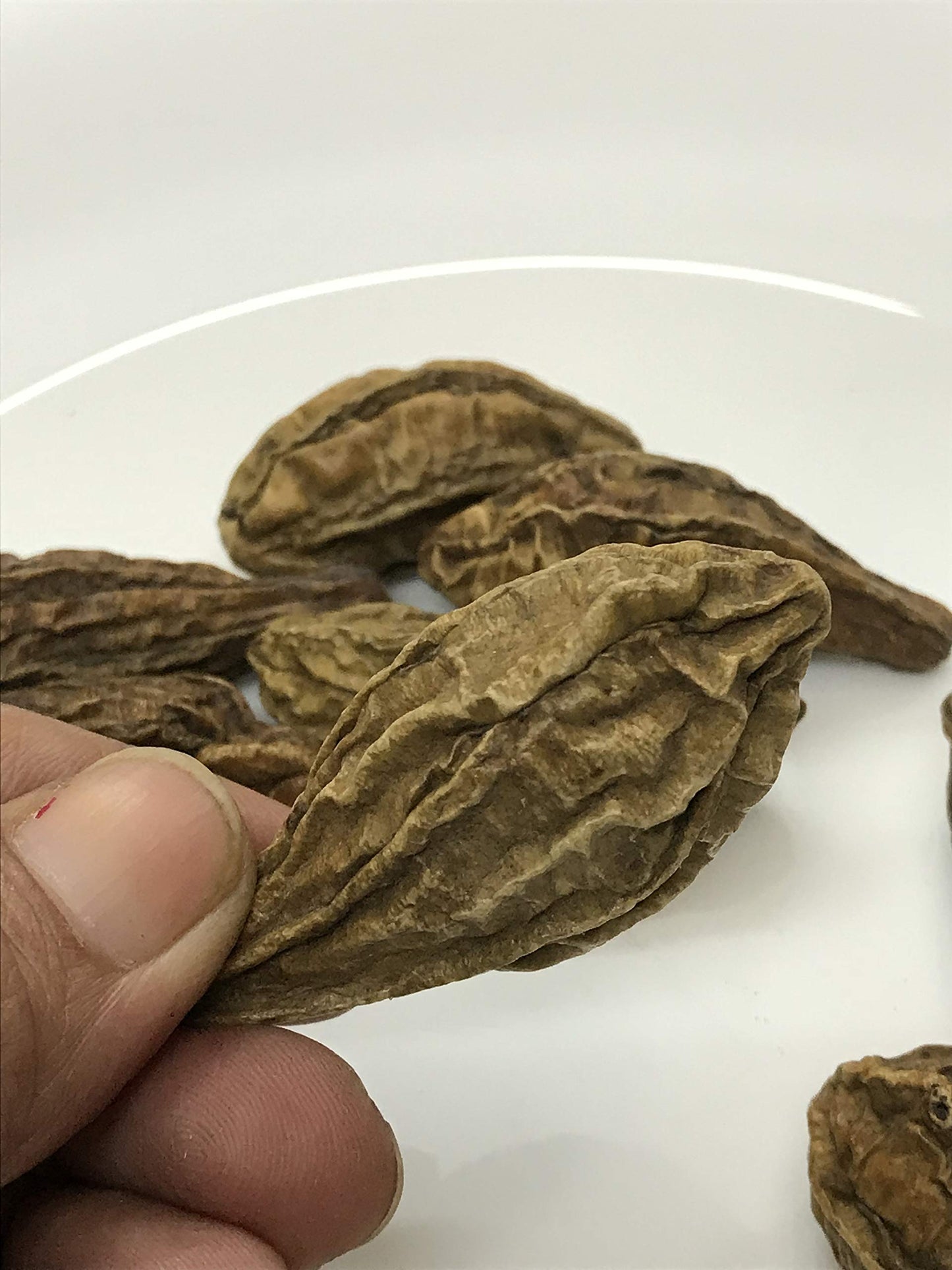 Side angle of the twenty pieces bag of Sanaa Zesty Chebulic Myrobalan herb.