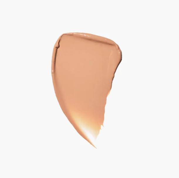 Jones Road What The Foundation cream balm texture inside jar with complementary sheet mask