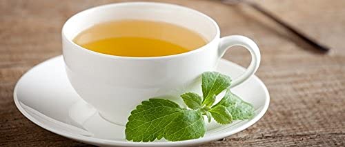 Clear hot herbal tea infusion brewed using authentic Nature Tea stevia leaves.