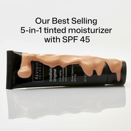 Revision anti aging tinted sunscreen tube on white background
