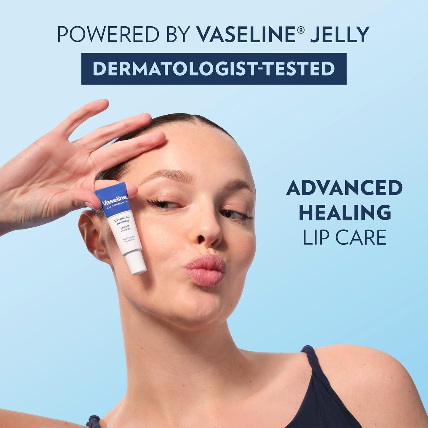 Vaseline Lip Therapy Advanced Healing tube held in hand for scale