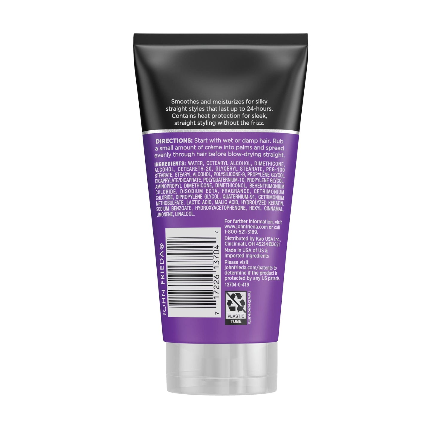 John Frieda Frizz Ease anti frizz styling cream tube held for application demonstration.