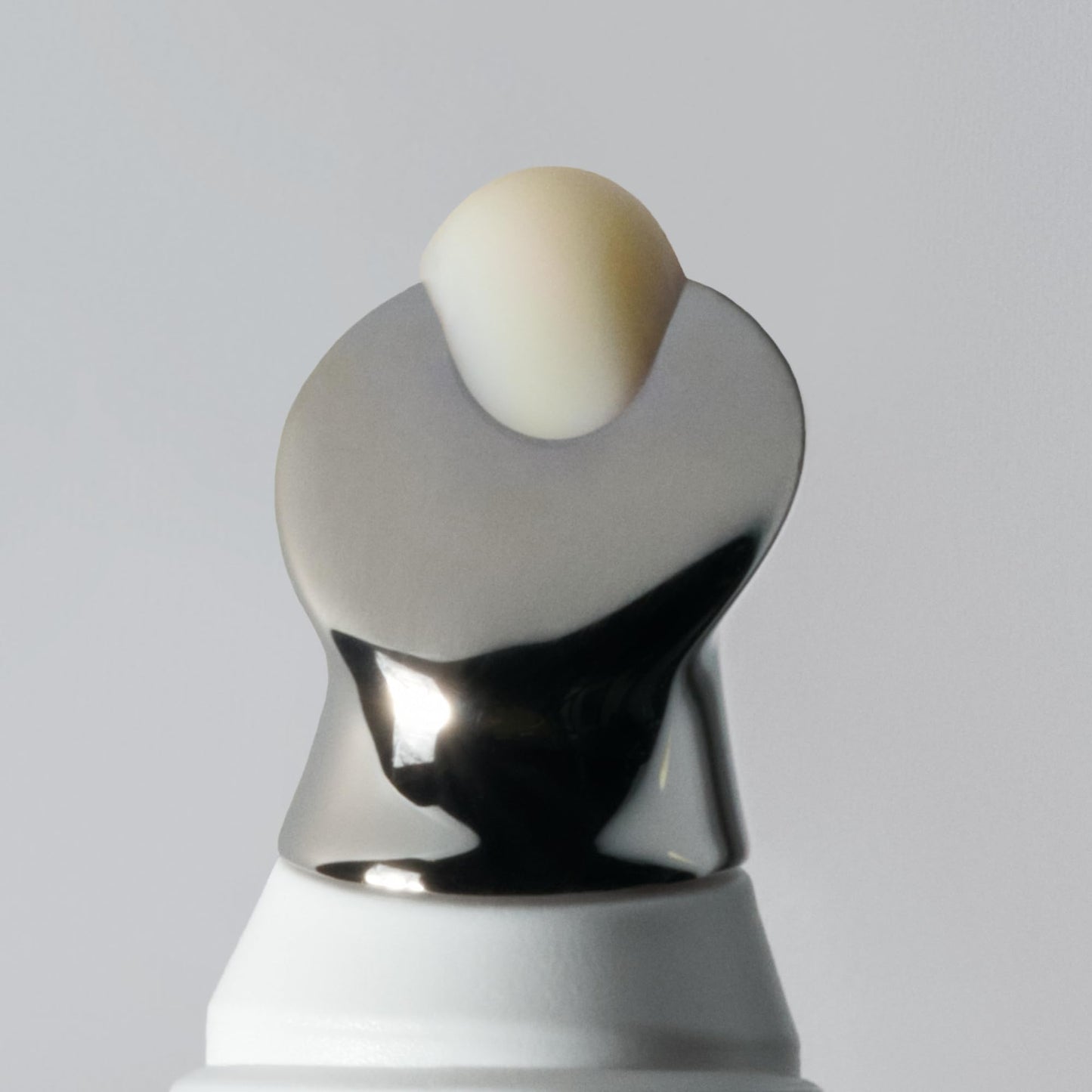 Compact size of OneSkin 7 milliliter lip SPF tube