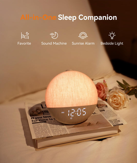 Dreamegg white noise sound machine showing the textured fabric covering and top physical control buttons