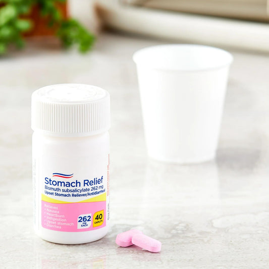 Equate pink bismuth subsalicylate tablets package showing multi symptom upset stomach relief details