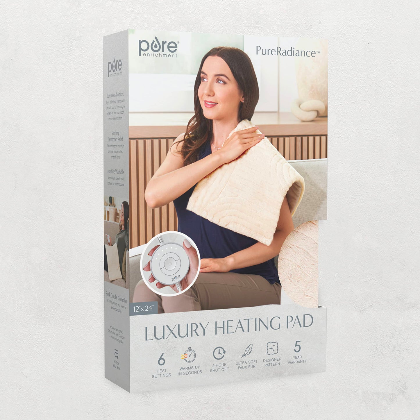 Pure Enrichment heating pad neatly folded inside its included matching storage bag for travel portability.