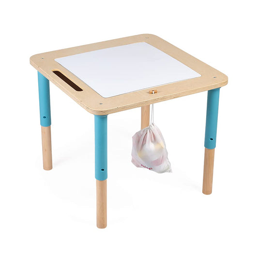 Toddler playing with Janod activity table sensory features
