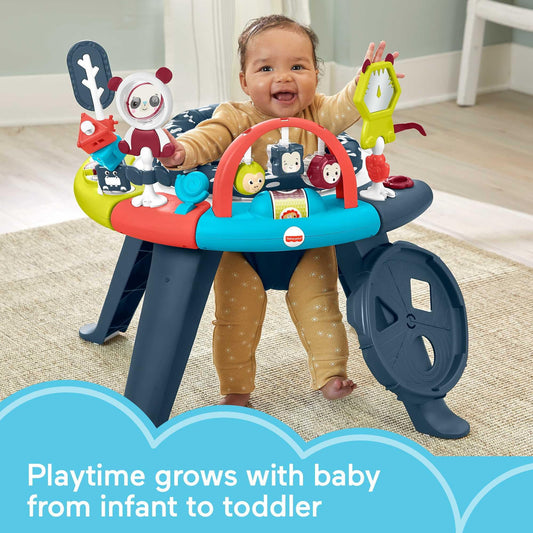 Infant using Fisher-Price activity center in seat mode