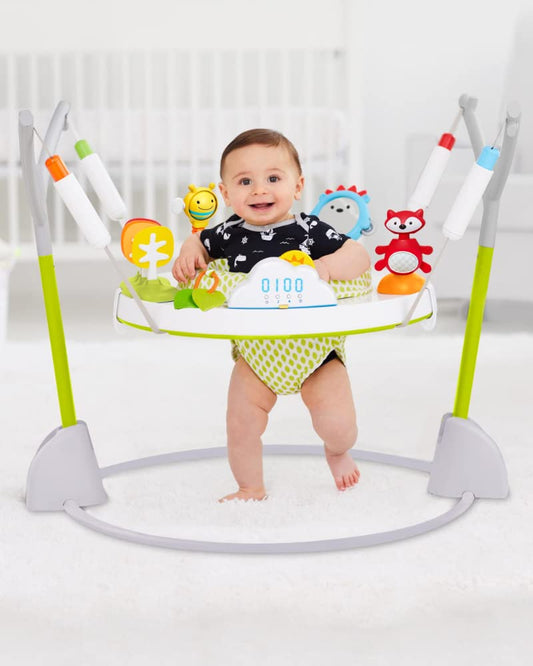 Baby playing in Skip Hop Jumpscape activity center