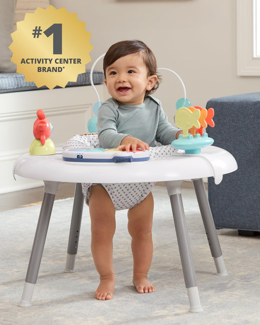 Baby using the Skip Hop Seascape 360-degree rotating seat