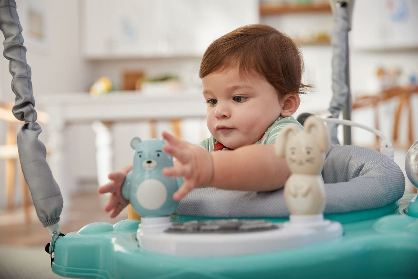 Safety 1st Bob and Twist Activity Center side profile with baby