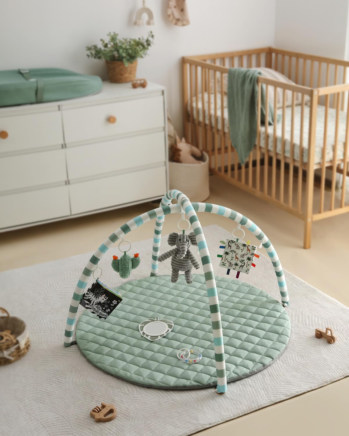 Infant playing on Blissful Diary stage-based sensory mat