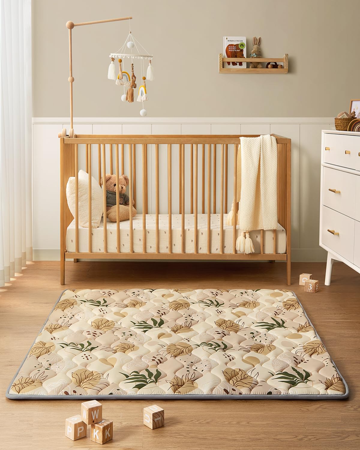 Infant playing comfortably on Blissful Diary earth tone mat