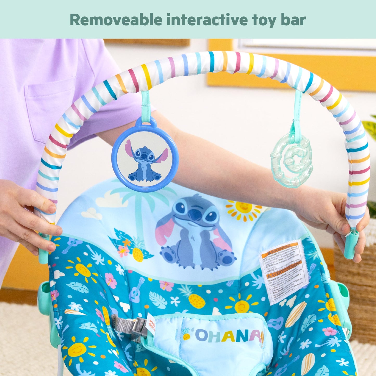 Bright Starts Disney Stitch bouncer in a nursery setting