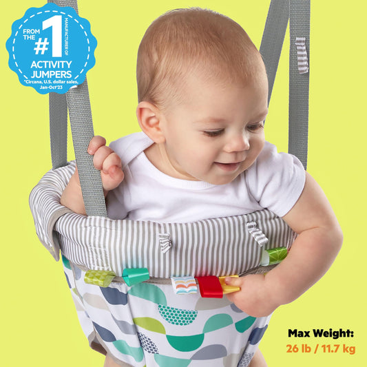 Baby using Bright Starts Playful Parade Door Jumper