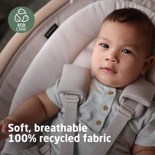 Maxi-Cosi infant swing showing three hundred sixty degree seat rotation mechanism.