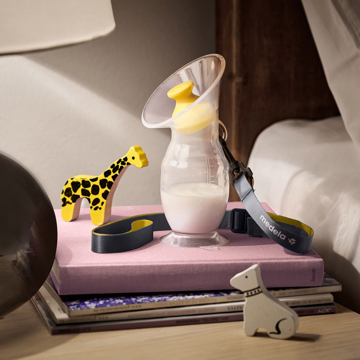 Packaging and contents of Medela silicone breast milk collector