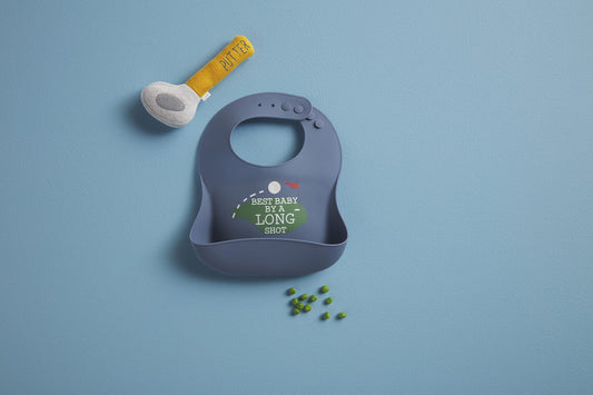 Mud Pie baby silicone bib with golf putter rattle accessory