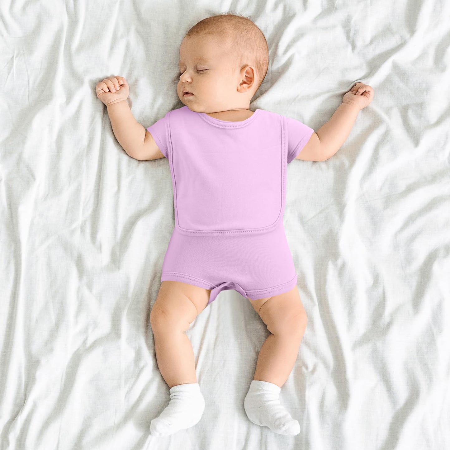 Hillban baby clothing set items arranged for baby shower gift