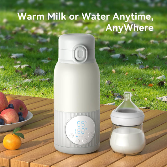 Grey portable milk warmer showing stainless steel interior