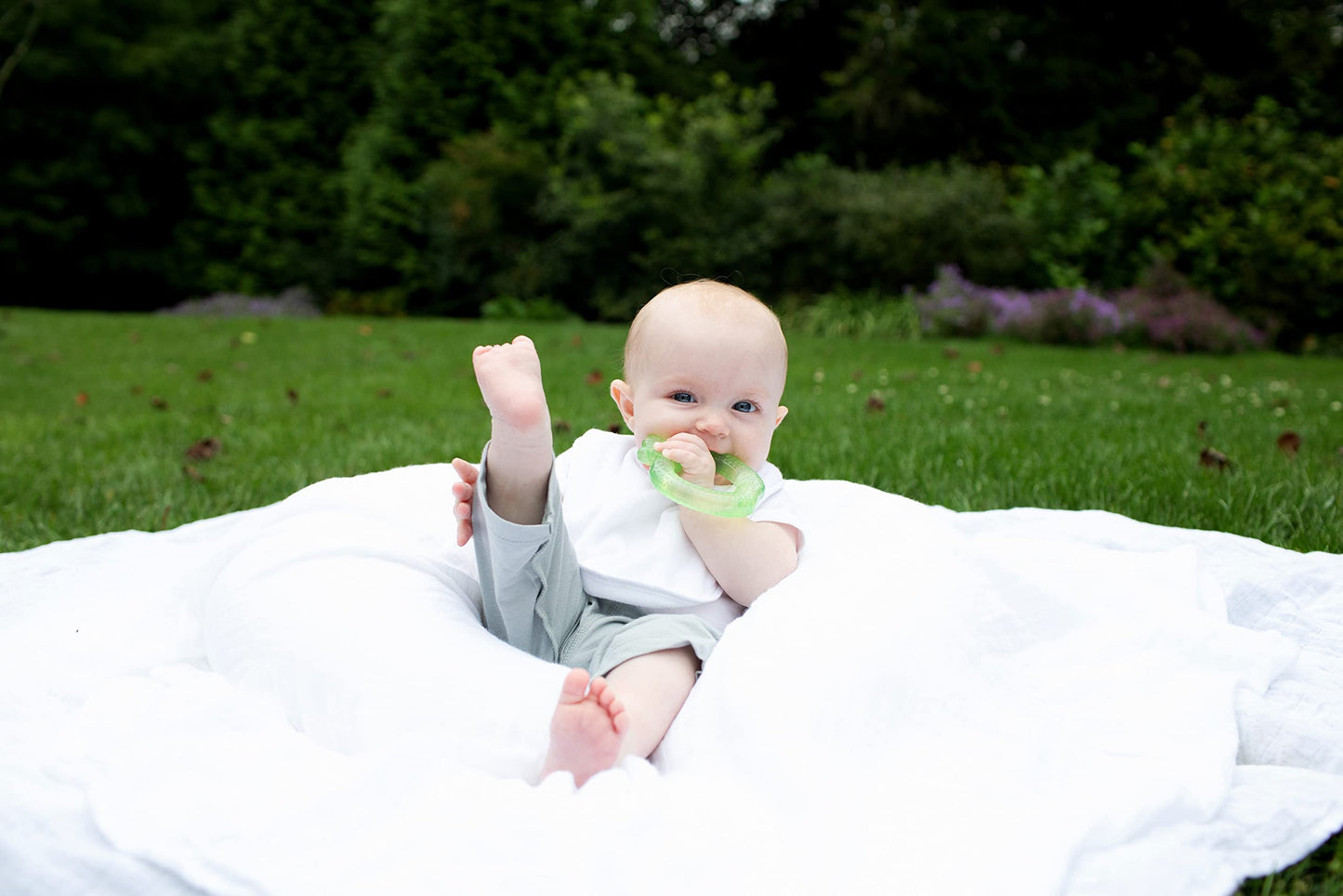 Green Sprouts stay dry bibs on baby model