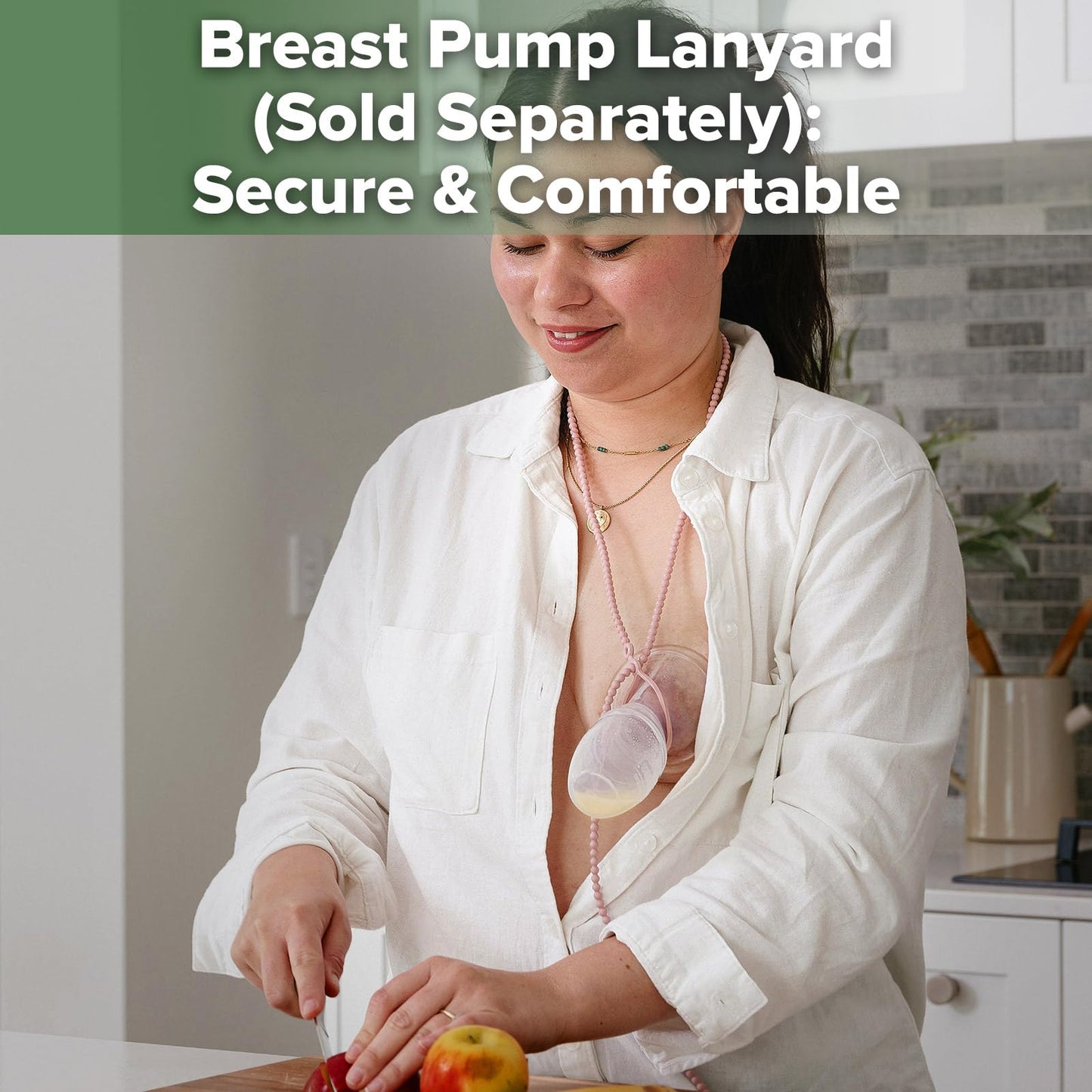Haakaa manual breastfeeding pump showing full silicone measurement markings