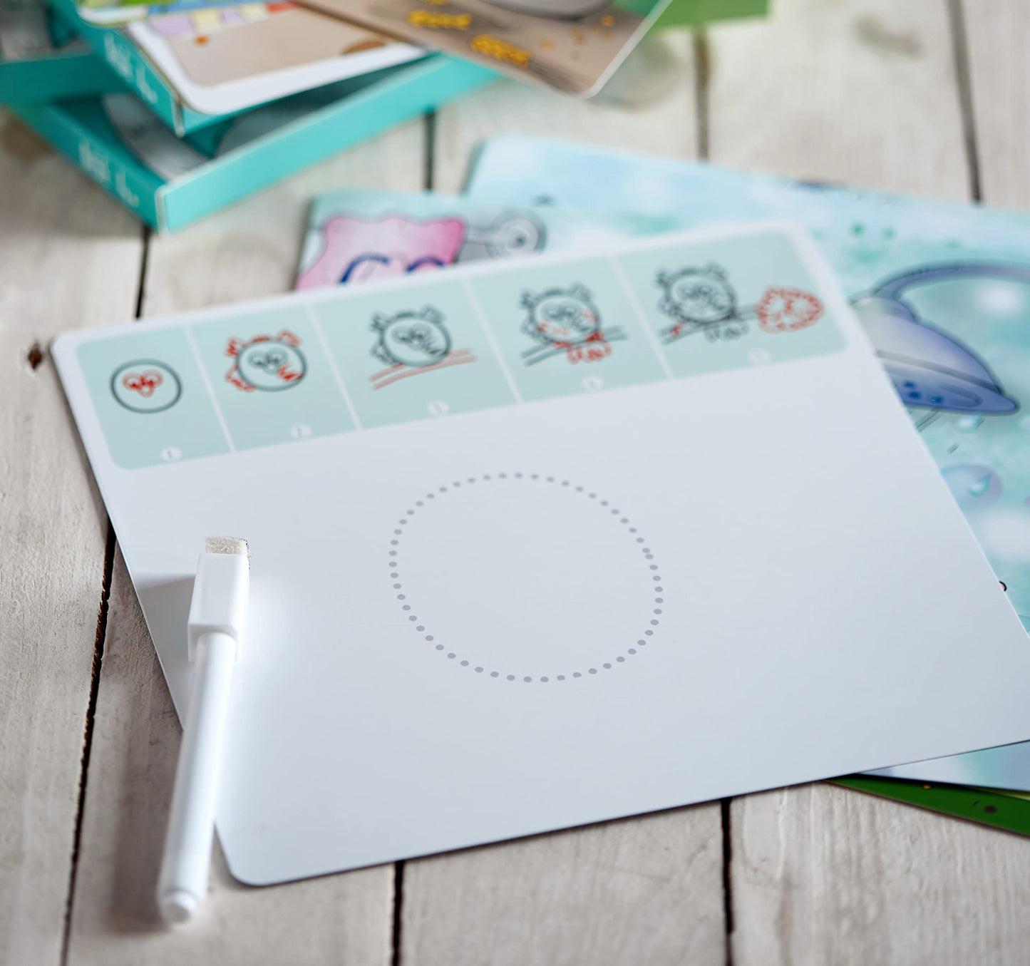 Back view of the product box displaying detailed benefits and handwriting practice examples.
