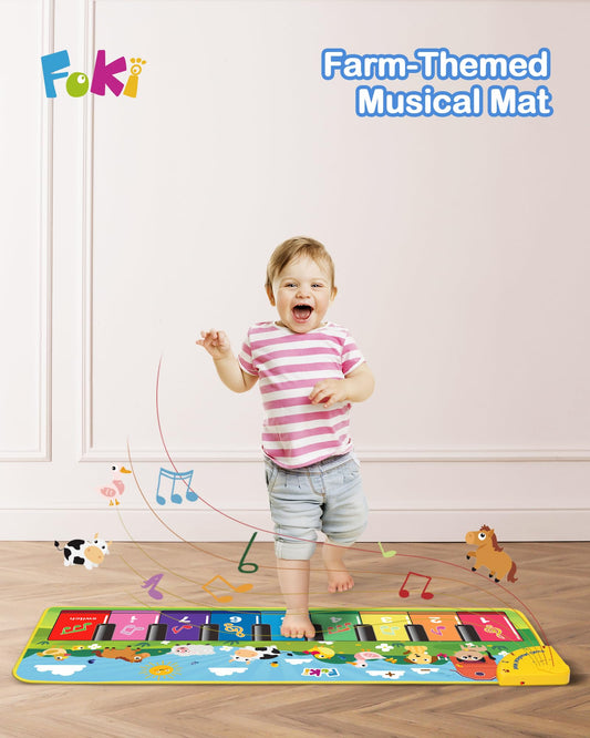 Toddler dancing on the Foki musical keyboard carpet toy for coordination learning