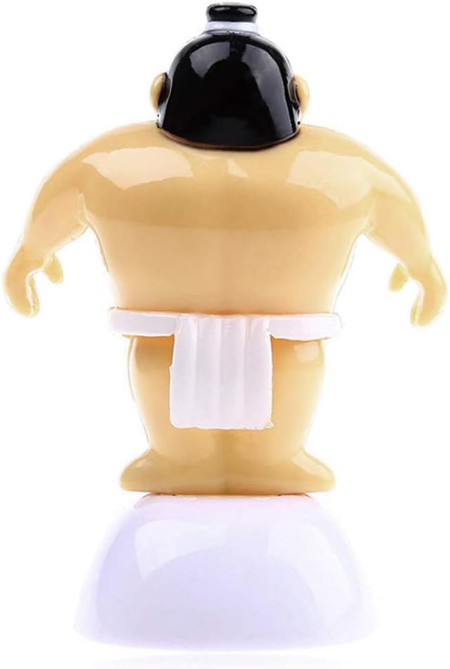 Detailed look at the photovoltaic cell on the PurYupearl sumo wrestler figurine base that powers the swinging motion.