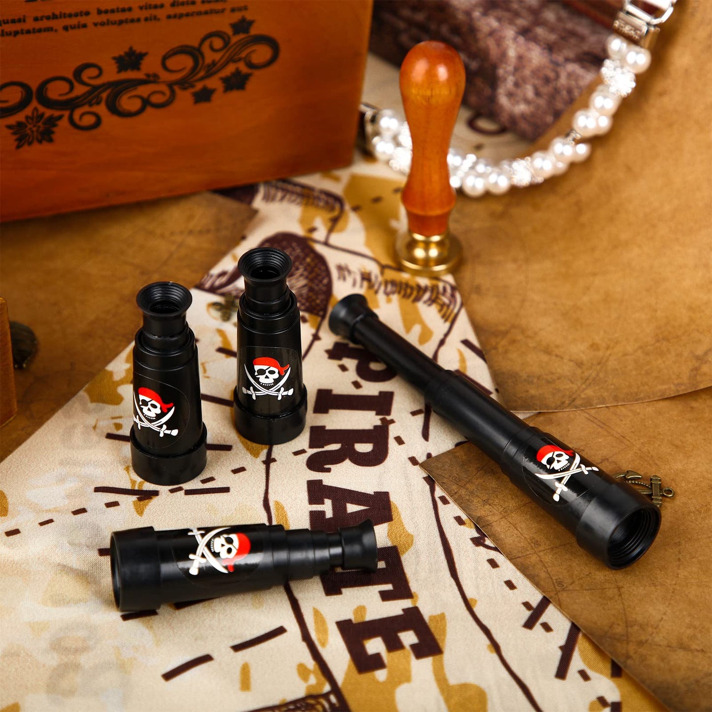 Imaginative treasure hunt setup featuring the novelty plastic telescopes alongside themed party decorations