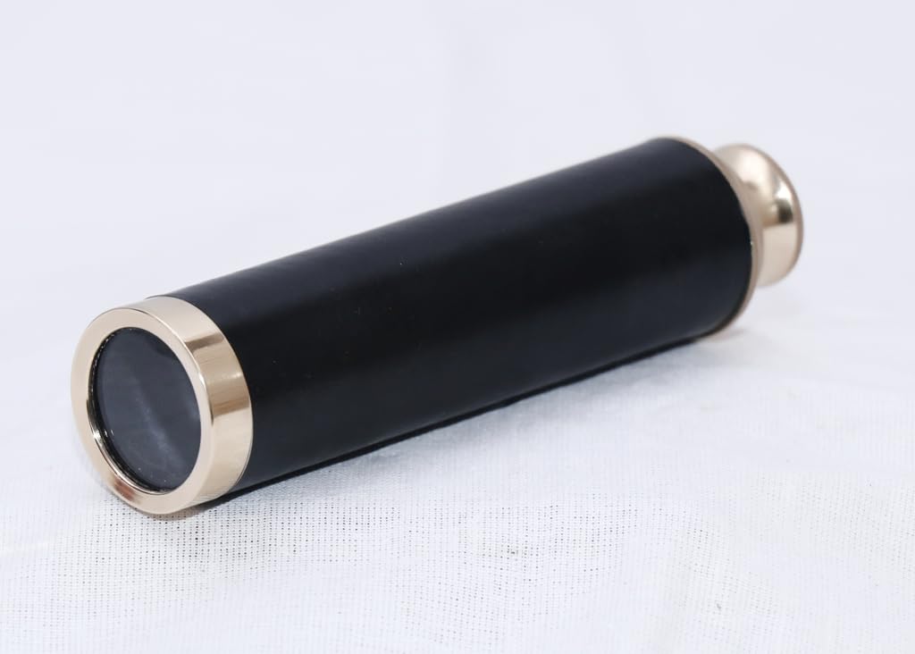 Vintage maritime brass telescope collectible safely resting inside its wooden anchor storage box