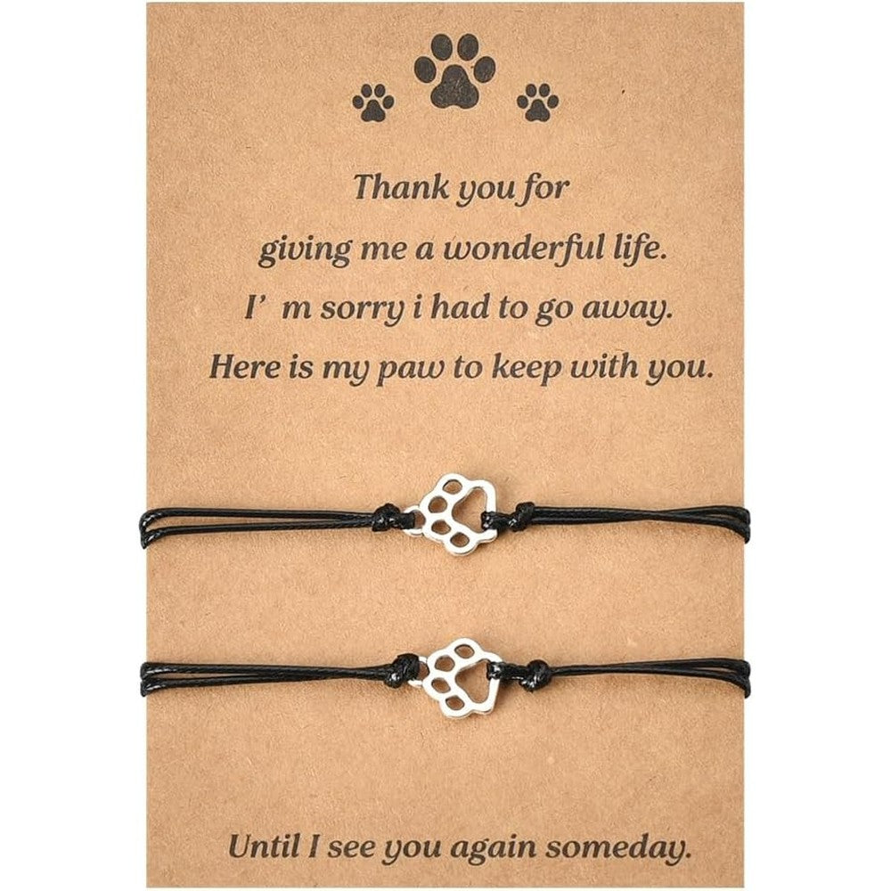 MXXGMYJ pet loss memorial bracelet front view showcasing two adjustable paw print charm wristbands.