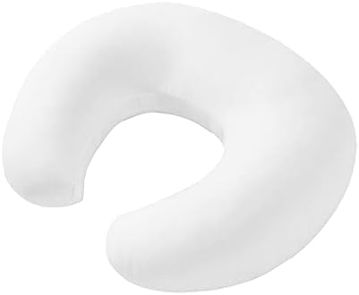 Baby sitting securely with the support of a nursing pillow
