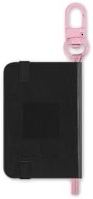 Close up view of Moleskine x Blackpink branding on notebook charm.