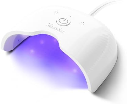 MelodySusie pocket sized portable gel nail dryer being used for at home manicures.