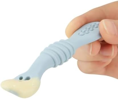 Soft flexible curved head of the PandaEar silicone toddler spoon demonstrating safety.