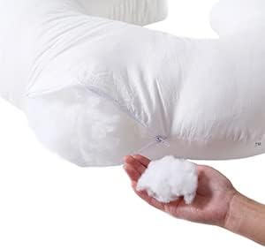 Mother using Queness nursing pillow for breastfeeding support