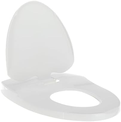 Nuby built-in potty training seat lowered down on an elongated white commode bowl for toddler use