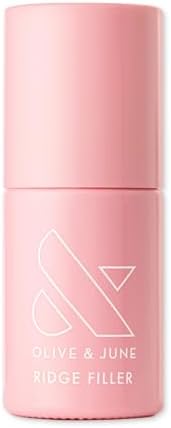 Pink tinted ridge filling nail treatment bottle with white brush cap