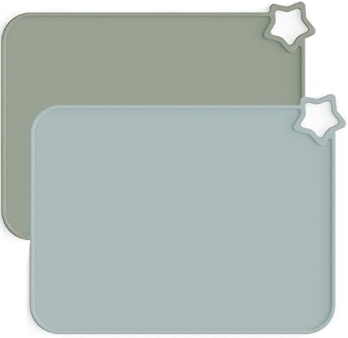 Close up of Moonkie baby table mat highlighting the raised edges that contain spills.