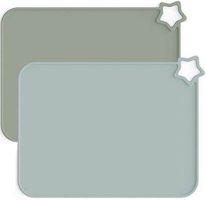 Close up of Moonkie baby table mat highlighting the raised edges that contain spills.