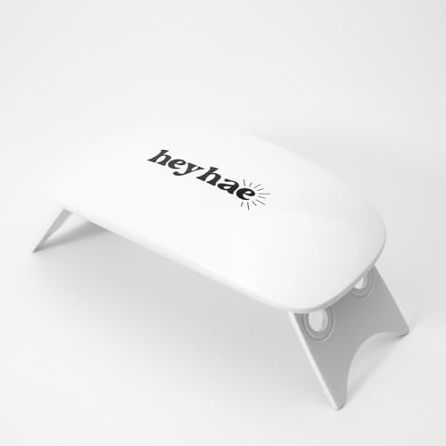 Heyhae portable UV light for gel nails with legs folded flat.