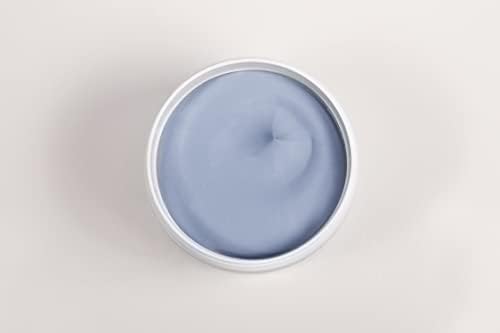 Close up view of authentic Bodipure clarifying peppermint body mud packaging highlighting botanical extracts.