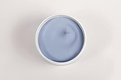 Close up view of authentic Bodipure clarifying peppermint body mud packaging highlighting botanical extracts.