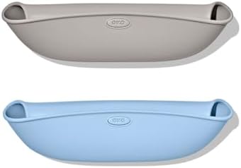 OXO Tot silicone baby bib rolled up into a compact travel size for diaper bags