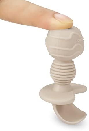 Top down layout of the pink six piece toddler self feeding utensil set for small hands.